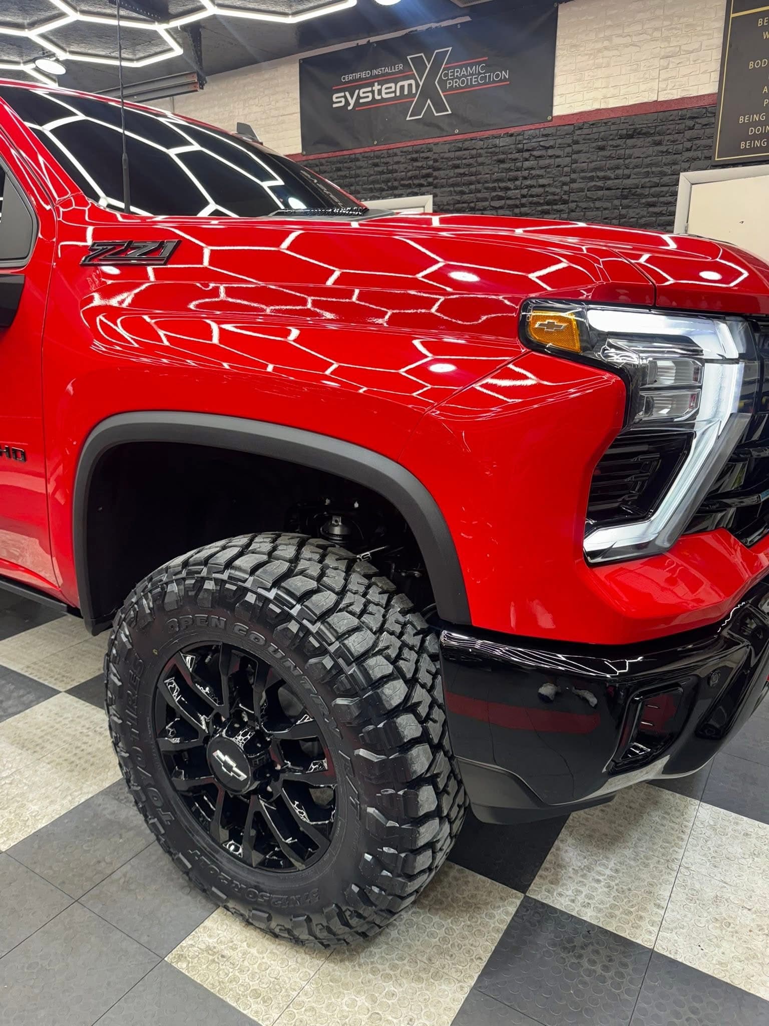 Lifted Ford F-250 Super Duty custom build by Elite Custom Automotive in Lockport, LA