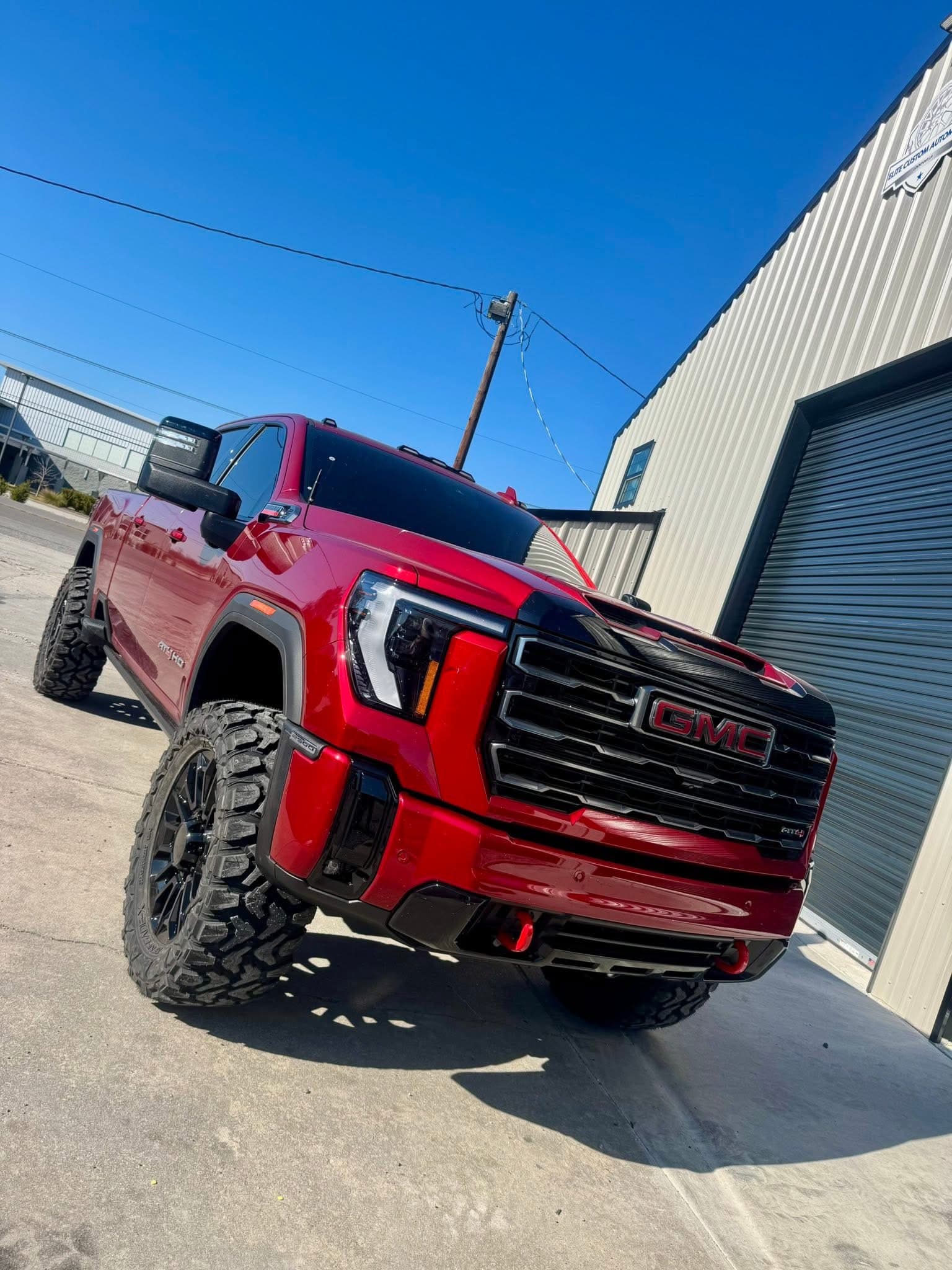 Custom forged wheels and mud-terrain tires installed by Elite Custom Automotive in Lockport, LA